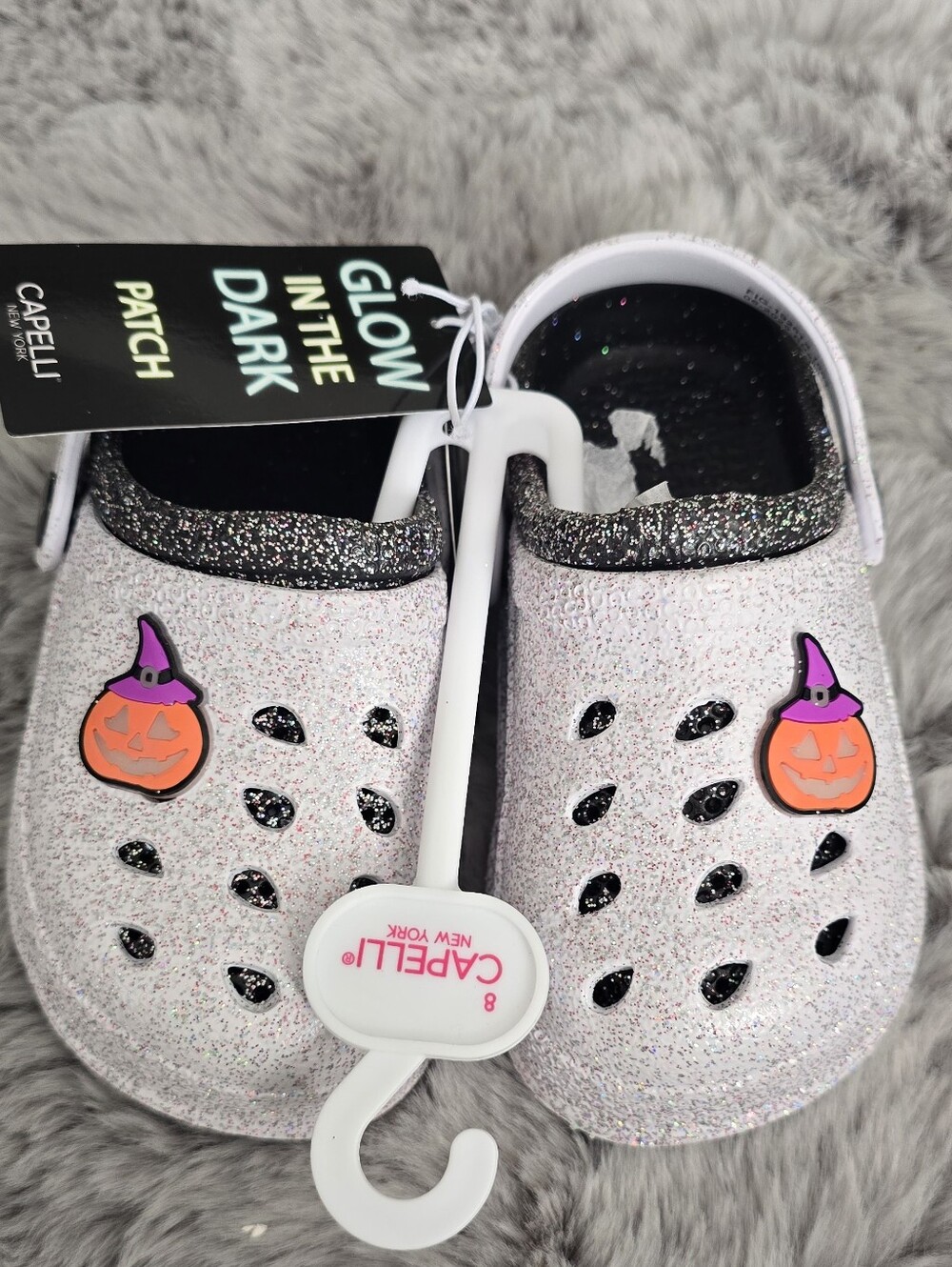 Capelli New York children's glitter clogs with glow-in-the-dark witch hat.